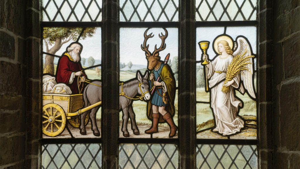 "St. Hubertus beim Anbinden eines Eselwagens" - Ostfenster in der Kirche St. Hubertus